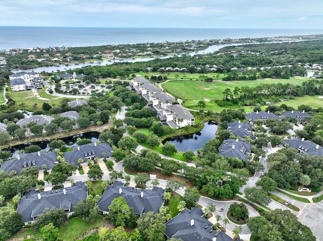 birds eye view of property with a residential view and a water view