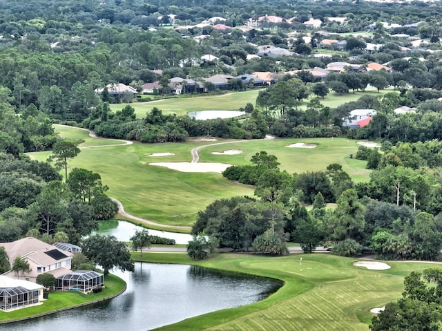 bird's eye view featuring a water view and golf course view