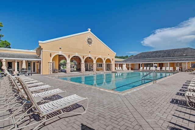 pool with a patio area