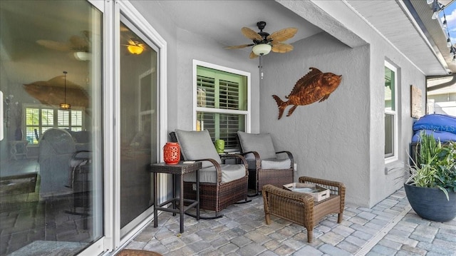 view of patio with a ceiling fan