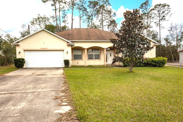 single story home with a garage, a shingled roof, driveway, stucco siding, and a front yard