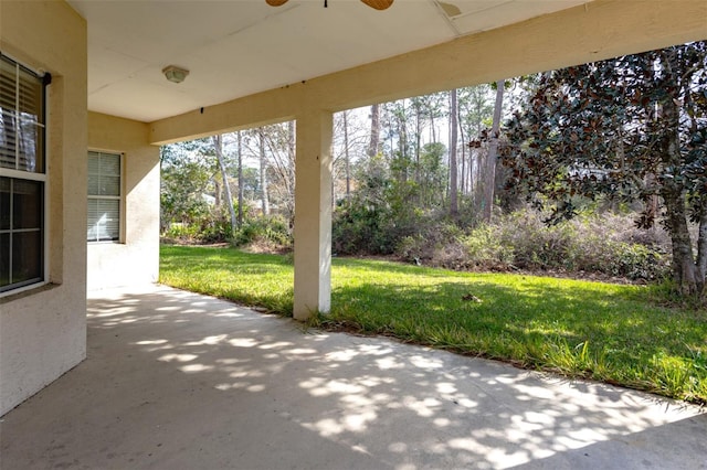 view of patio / terrace featuring ceiling fan