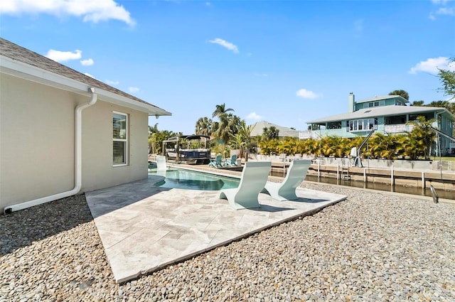 exterior space featuring a fenced in pool