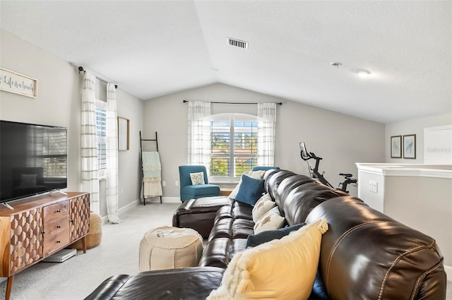 living room featuring baseboards, visible vents, lofted ceiling, a textured ceiling, and carpet flooring