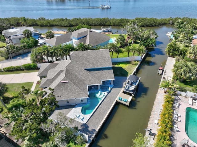 drone / aerial view with a water view