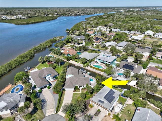 aerial view with a residential view and a water view