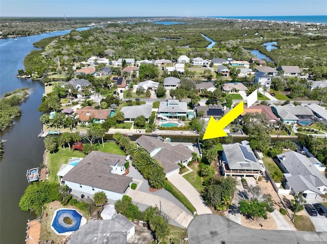 aerial view with a water view and a residential view