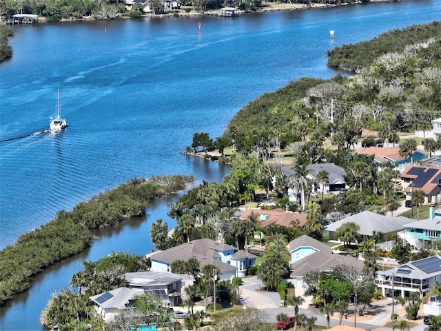 aerial view featuring a water view and a residential view