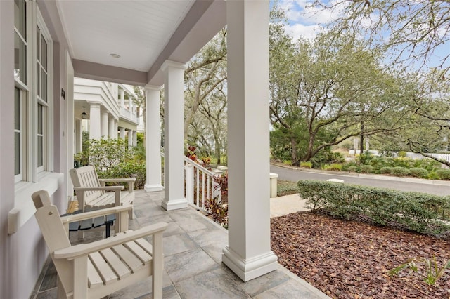 view of patio featuring a porch