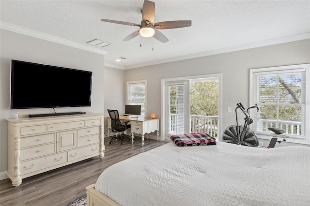 bedroom with a ceiling fan, wood finished floors, access to exterior, a textured ceiling, and crown molding