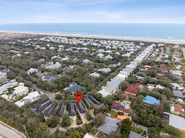 birds eye view of property with a residential view and a water view