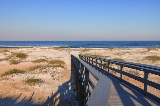 view of water feature with a beach view