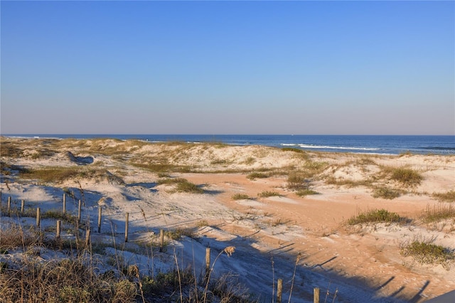 water view featuring a beach view