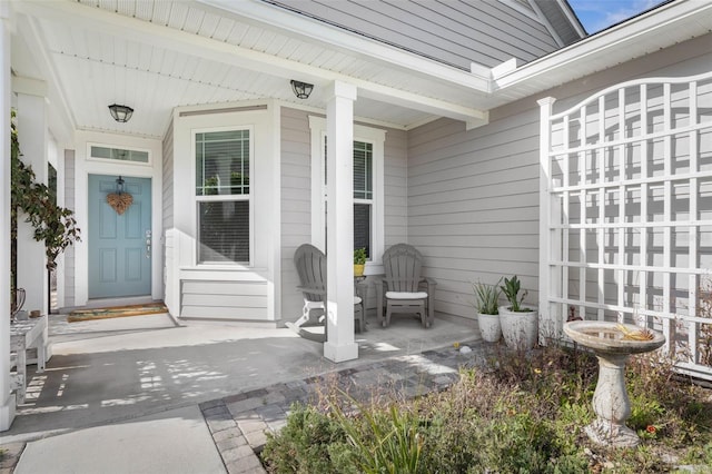 entrance to property with a porch