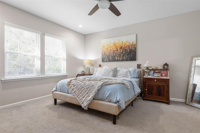 carpeted bedroom with recessed lighting, ceiling fan, and baseboards