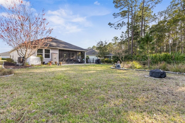 view of yard featuring a sunroom