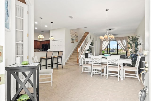 dining area featuring light tile patterned floors, recessed lighting, a notable chandelier, visible vents, and stairway