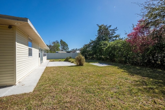 view of yard with a patio area and fence