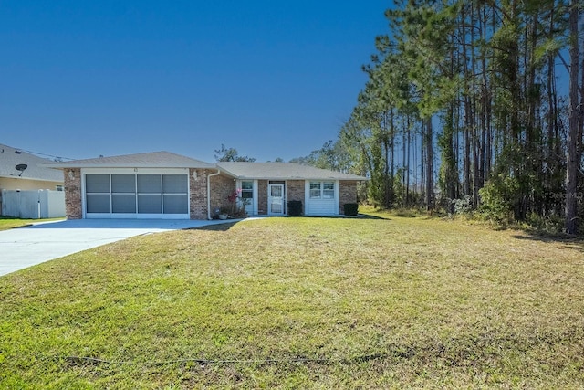 ranch-style home featuring fence, an attached garage, a front lawn, concrete driveway, and brick siding