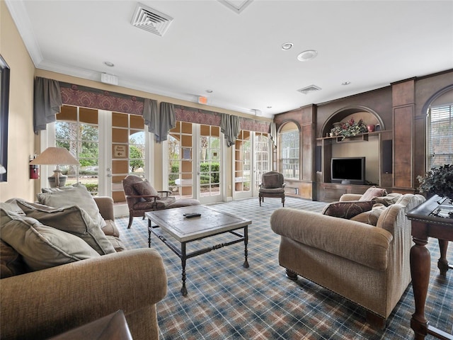 living room featuring visible vents and dark carpet