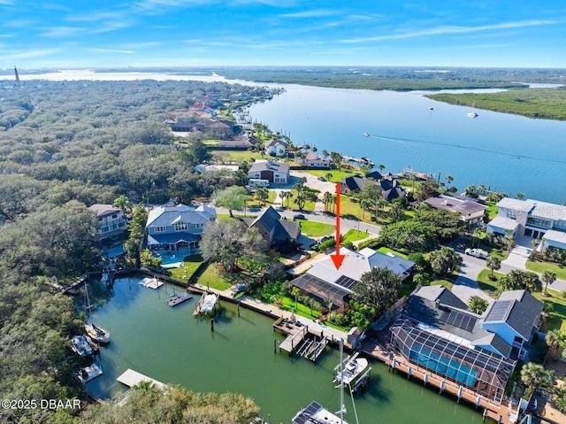 bird's eye view with a water view and a residential view