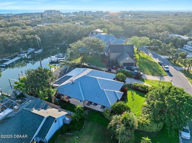 birds eye view of property featuring a water view