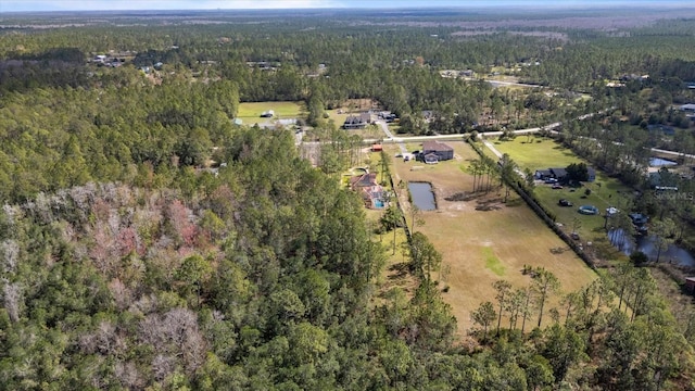 aerial view with a wooded view