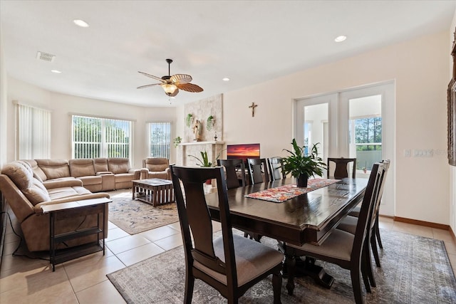 dining room with recessed lighting, light tile patterned flooring, visible vents, and a healthy amount of sunlight