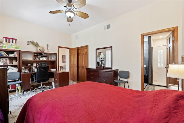 bedroom featuring connected bathroom and visible vents