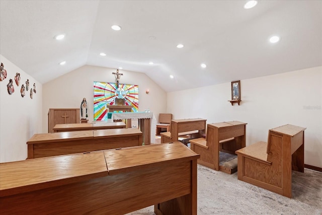 carpeted office with recessed lighting and vaulted ceiling