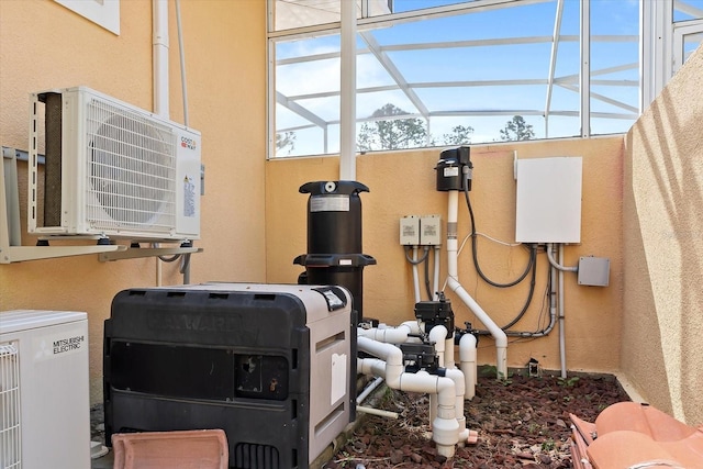 exterior details featuring ac unit and stucco siding