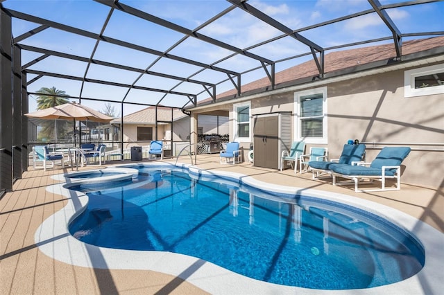 view of swimming pool with a pool with connected hot tub, a patio area, and a lanai