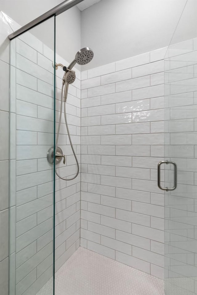 full bathroom with a stall shower