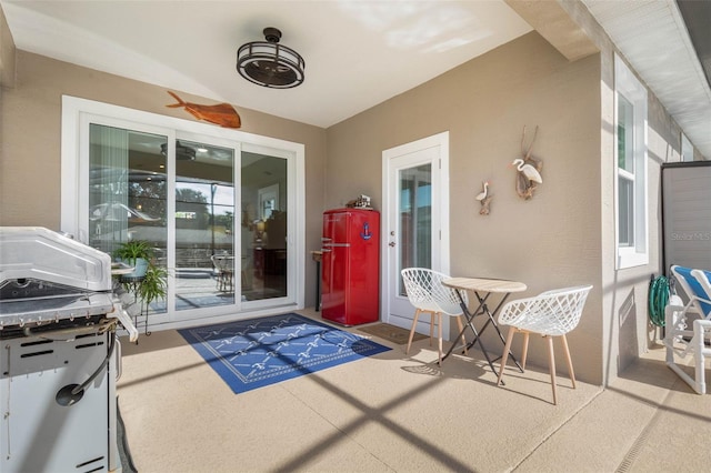 interior space featuring a ceiling fan