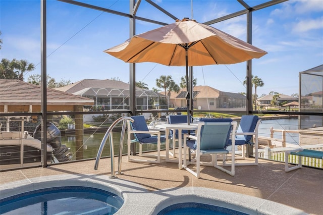 view of swimming pool with glass enclosure, outdoor dining area, and a hot tub