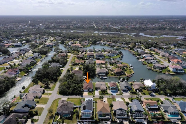 aerial view featuring a water view and a residential view