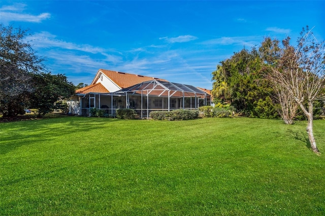 view of yard featuring a lanai