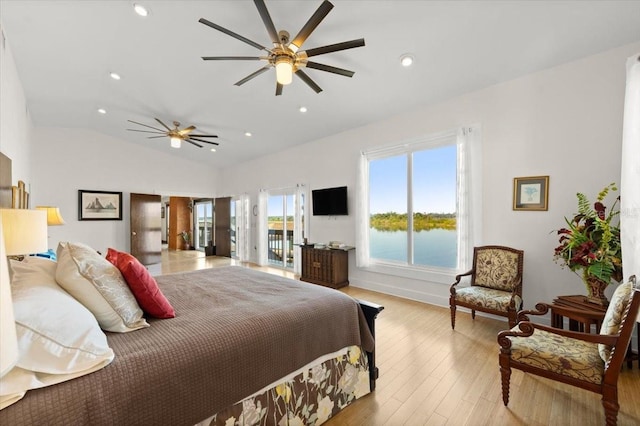 bedroom with light wood finished floors, lofted ceiling, recessed lighting, a ceiling fan, and access to outside