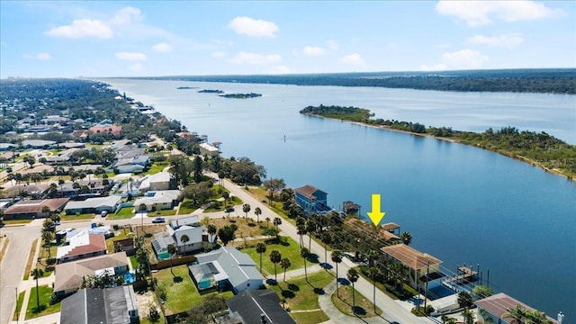 drone / aerial view featuring a water view