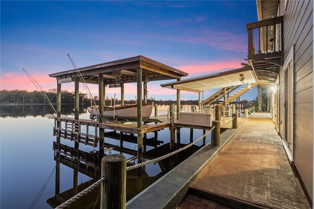 dock area featuring a water view and boat lift