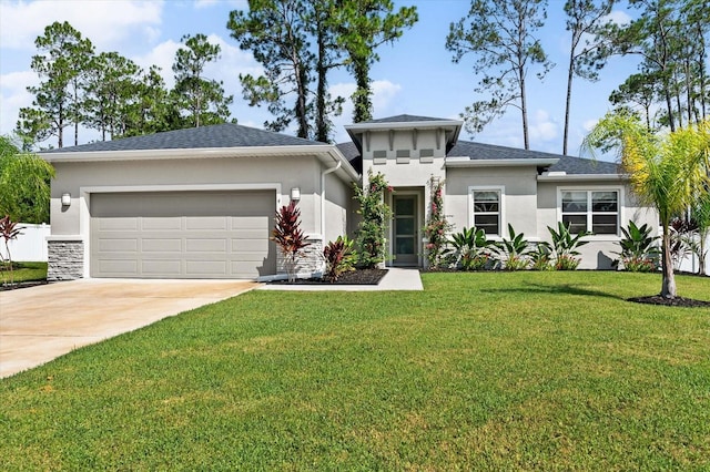 prairie-style home with driveway, a shingled roof, stucco siding, an attached garage, and a front yard