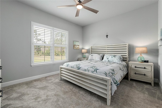 bedroom featuring carpet floors, baseboards, and a ceiling fan