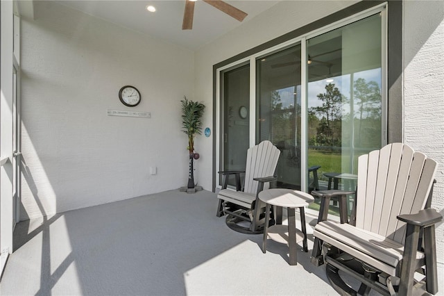 view of patio / terrace featuring ceiling fan