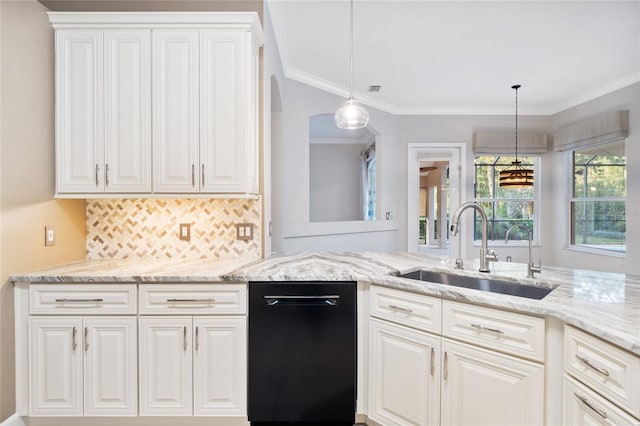 kitchen featuring crown molding, white cabinets, light stone countertops, and a sink