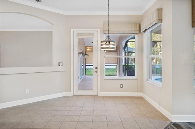 unfurnished dining area with light tile patterned floors, baseboards, a notable chandelier, and crown molding