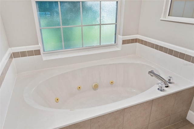 full bath featuring a whirlpool tub