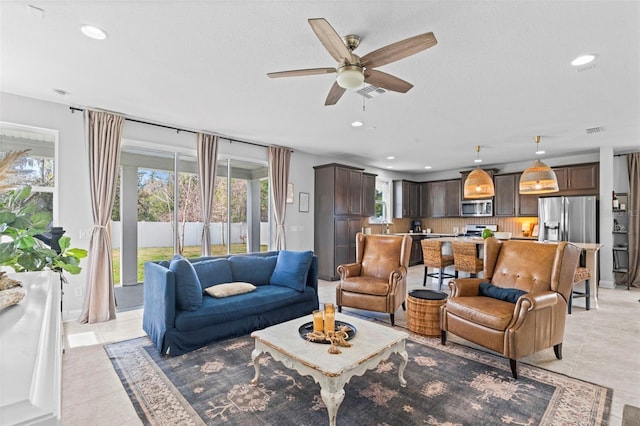 562 Kendall Crossing Dr, Saint Johns, FL 32259 - living room with visible vents, a ceiling fan, recessed lighting, and light tile patterned floors
