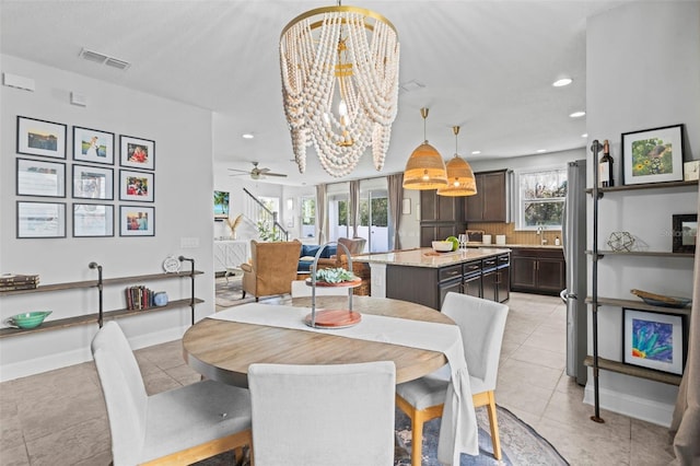 562 Kendall Crossing Dr, Saint Johns, FL 32259 - dining space with baseboards, recessed lighting, light tile patterned floors, visible vents, and ceiling fan with notable chandelier