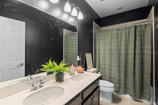 562 Kendall Crossing Dr, Saint Johns, FL 32259 - bathroom featuring double vanity, curtained shower, a sink, and toilet