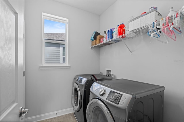 562 Kendall Crossing Dr, Saint Johns, FL 32259 - washroom featuring washer and dryer, laundry area, and baseboards